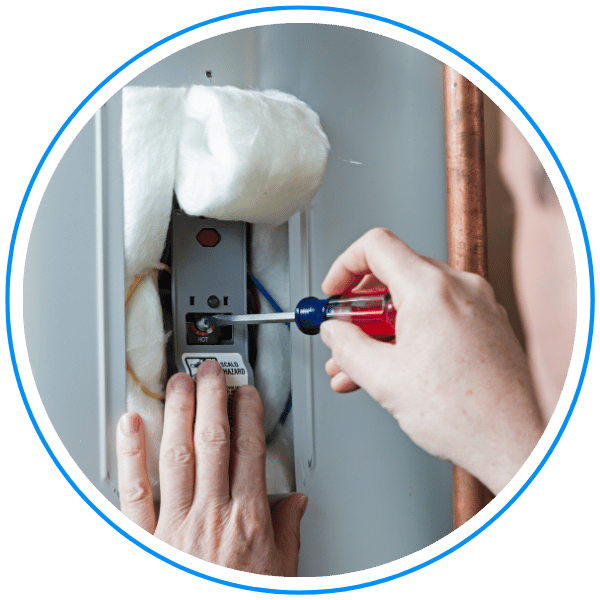 person turns screwdriver to repair water heater